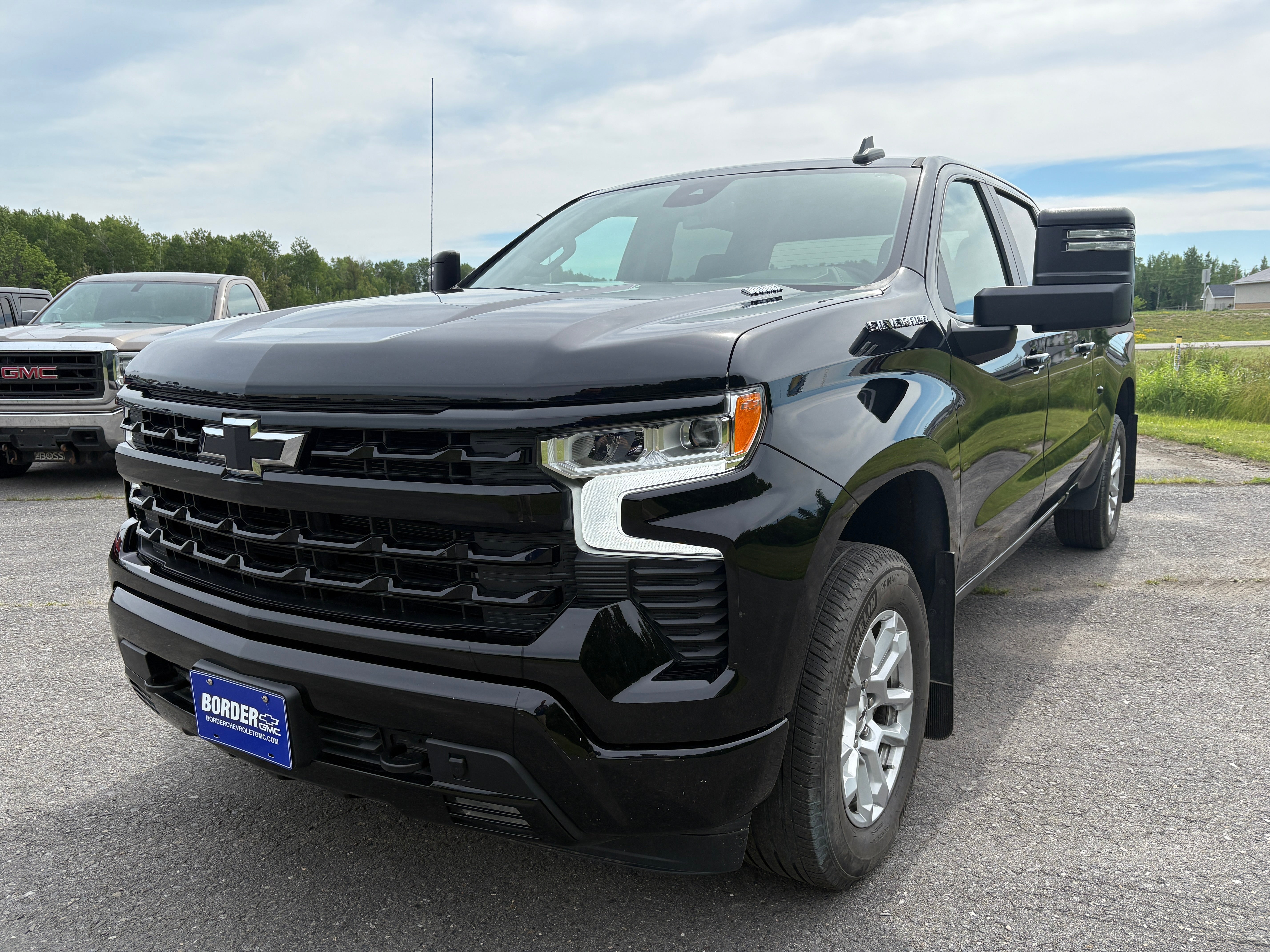 2022 Chevrolet Silverado 1500 RST in Black — front three-quarter view