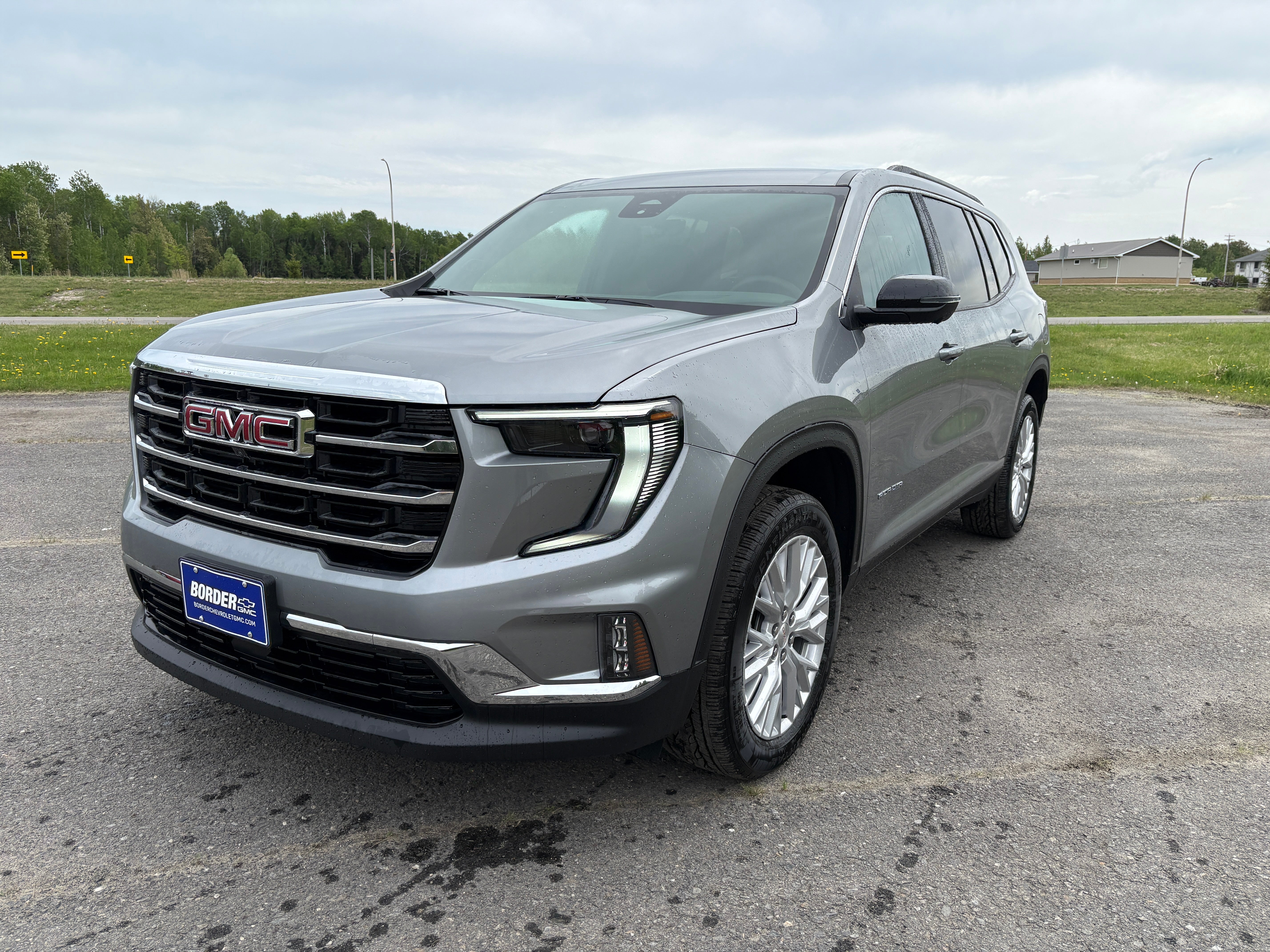 2026 GMC Acadia Elevation in Sterling Metallic — front three-quarter view