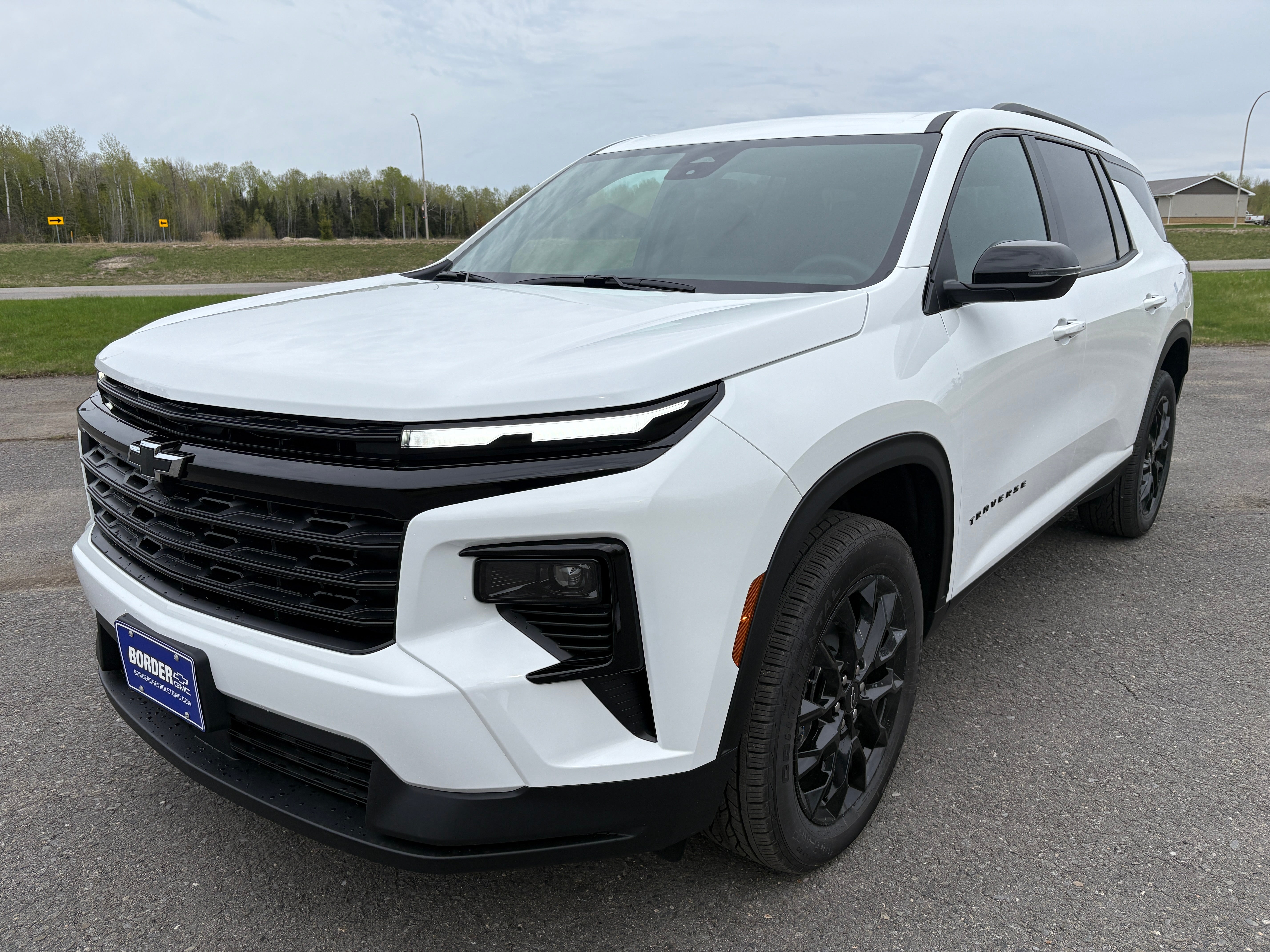 2026 Chevrolet Traverse LT in Summit White — front three-quarter view