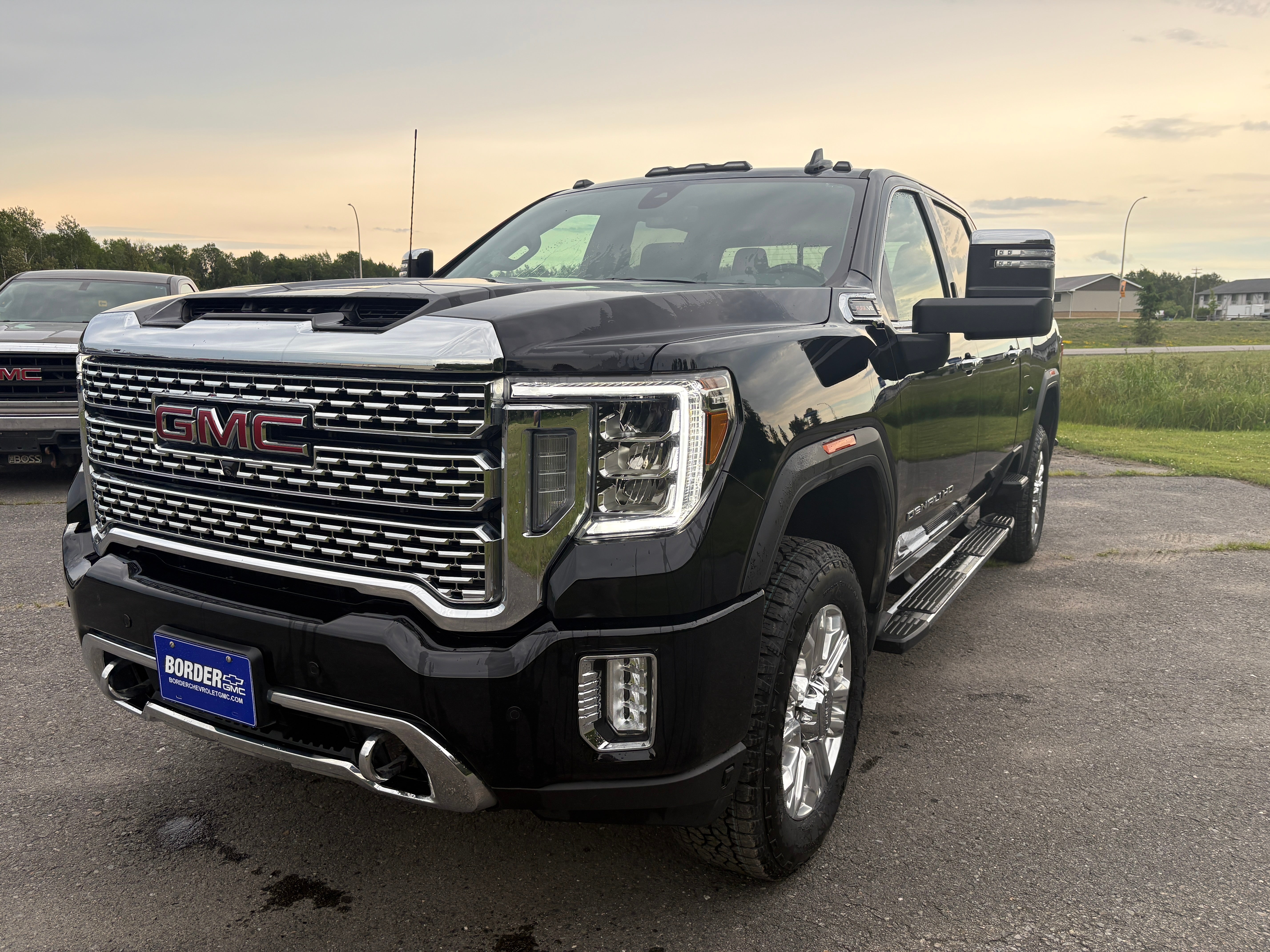 2023 GMC Sierra 2500 HD Denali in Onyx Black — front three-quarter view