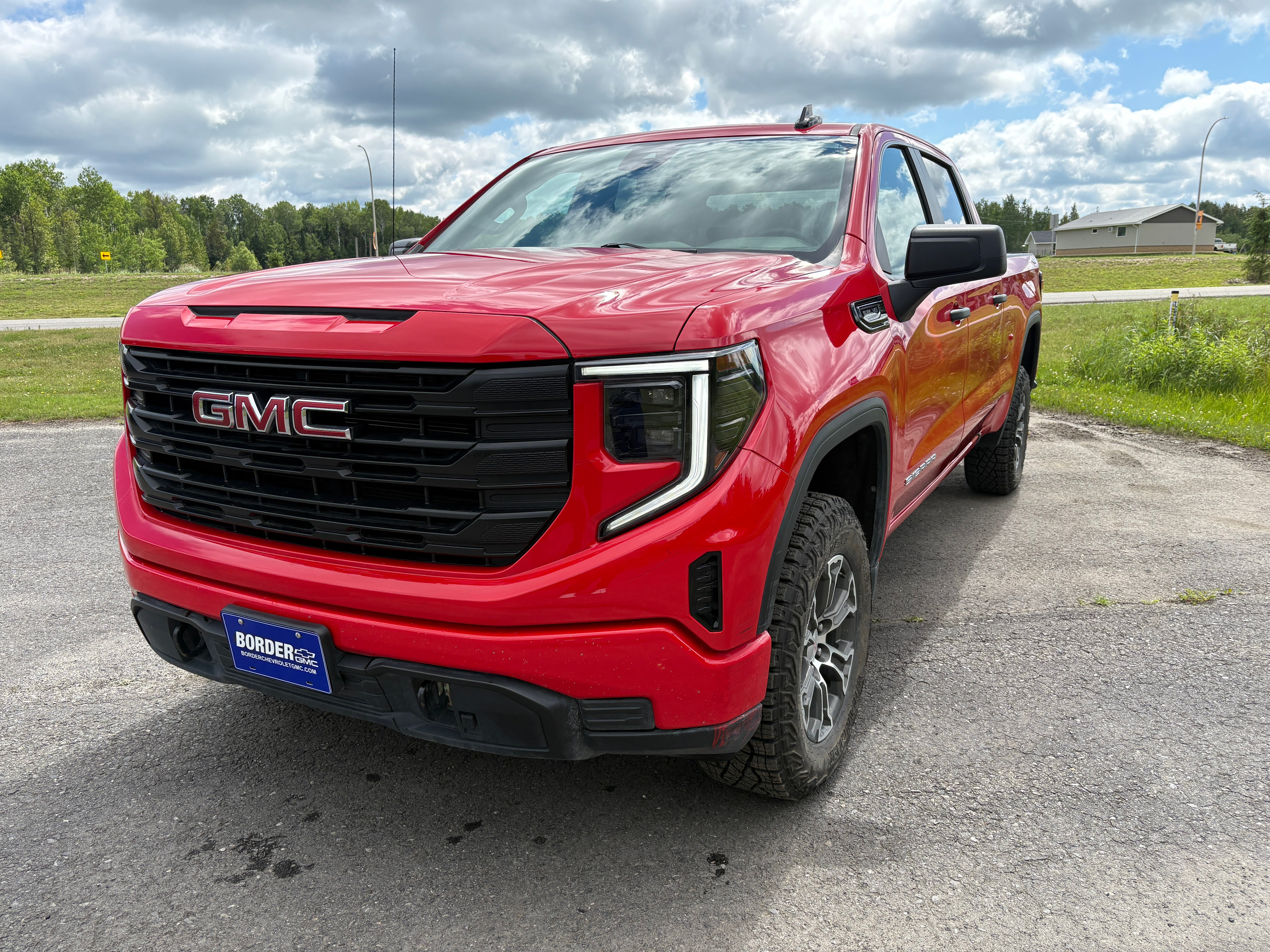 2024 GMC Sierra 1500 Pro in Cardinal Red — front three-quarter view