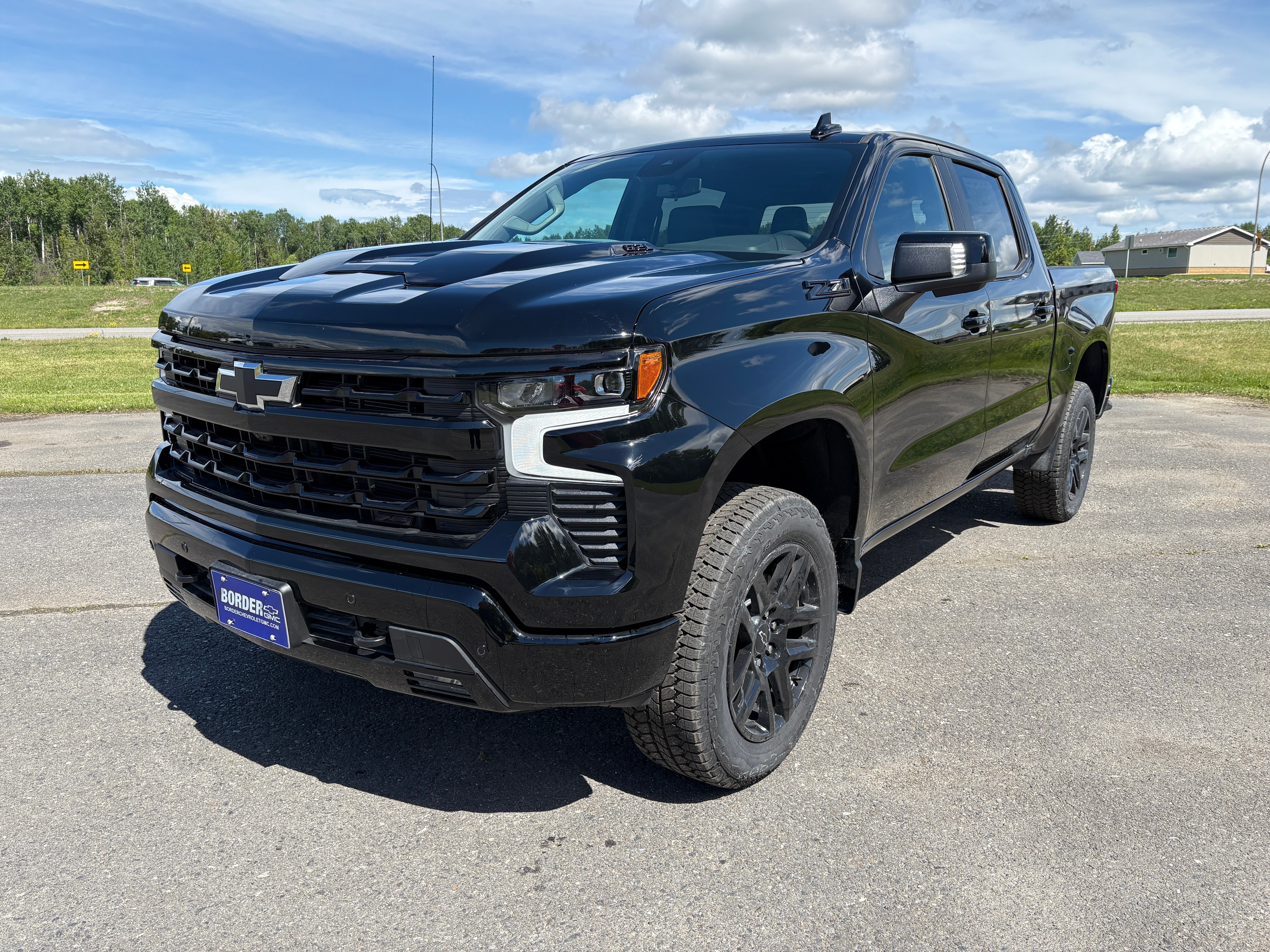 2026 Chevrolet Silverado 1500 LT Trail Boss in Black — front three-quarter view