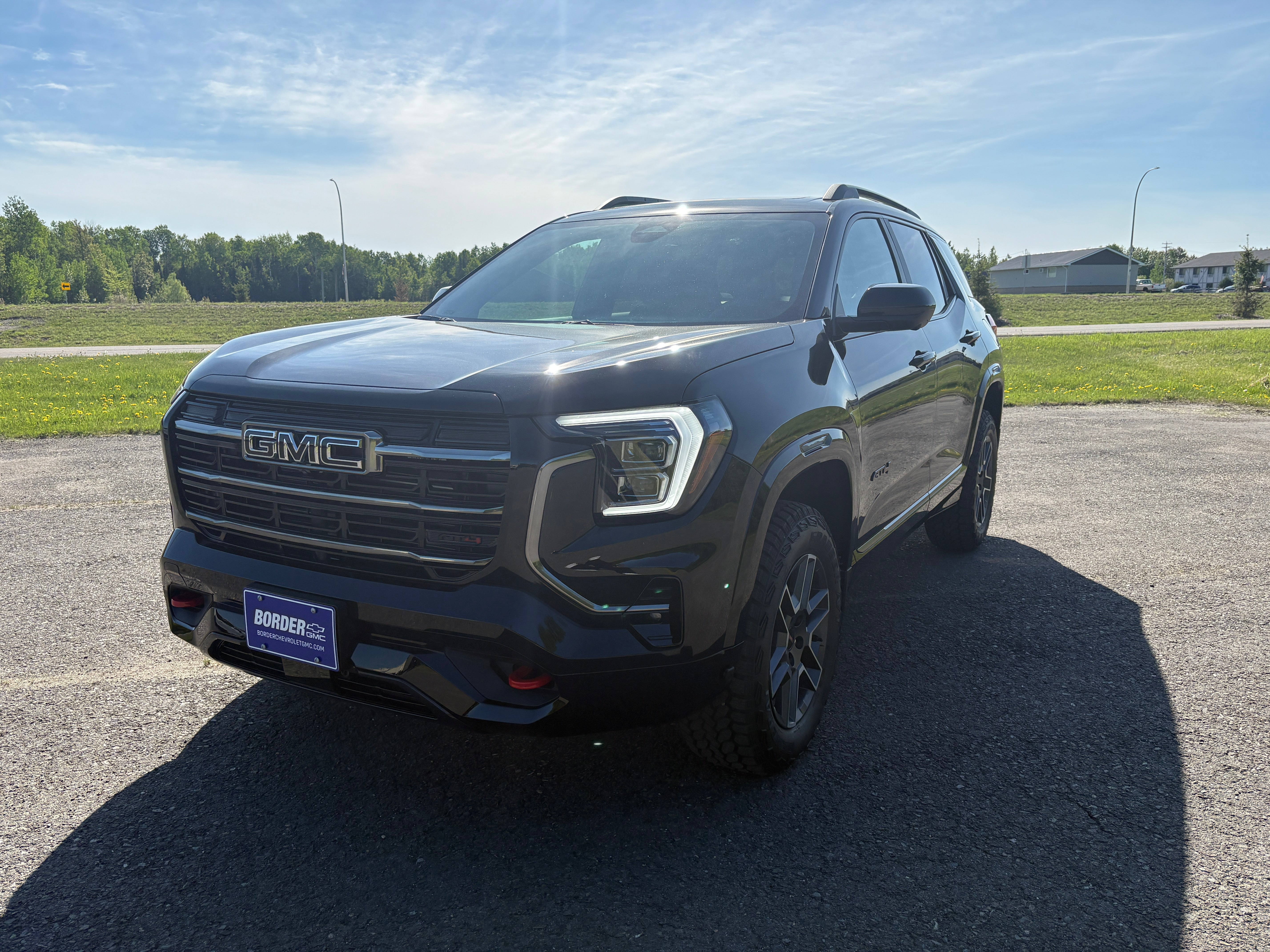 2026 GMC Terrain AT4 in Ebony Twilight Metallic — front three-quarter view